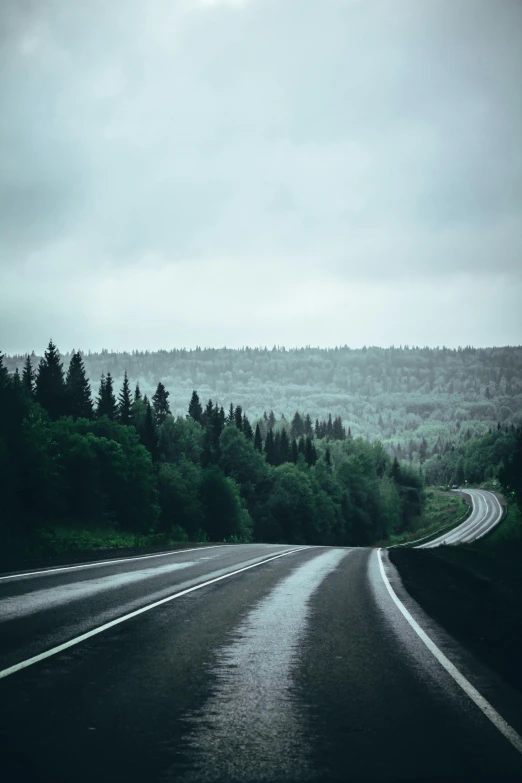 the wet road on the side of the highway