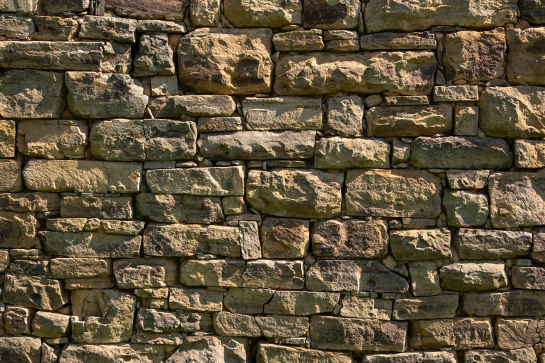 a wall made from stone bricks that resembles the ocean