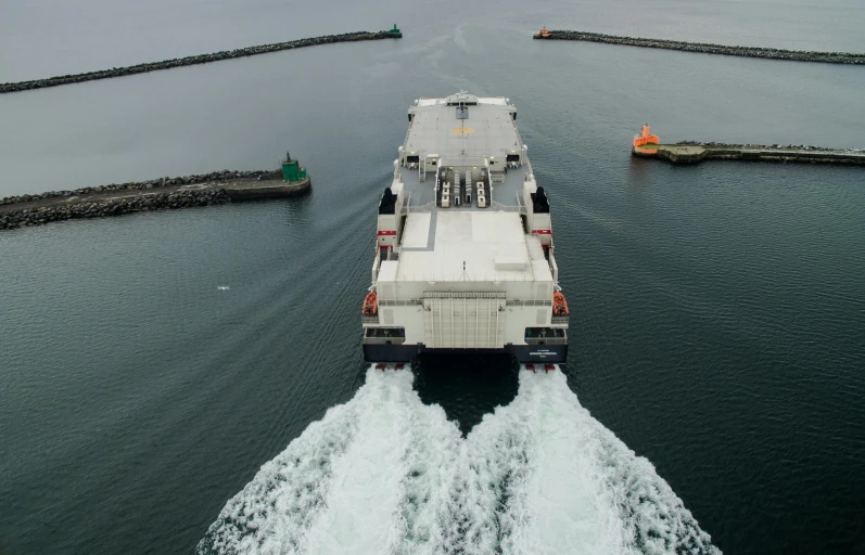 a large ship in the middle of a body of water