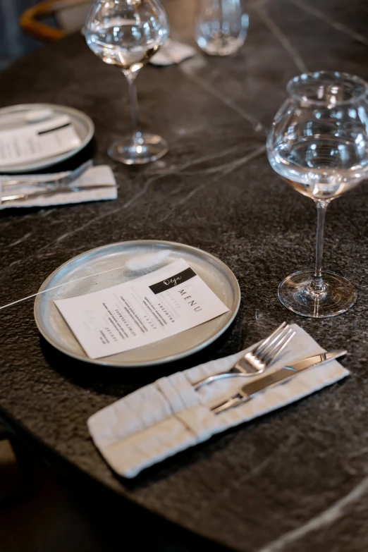 table set with place settings and utensils for one person