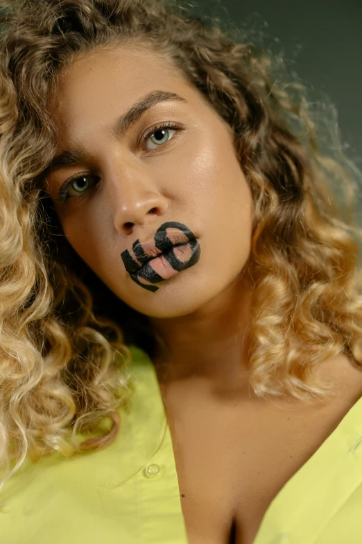 an image of a woman with a painted nose