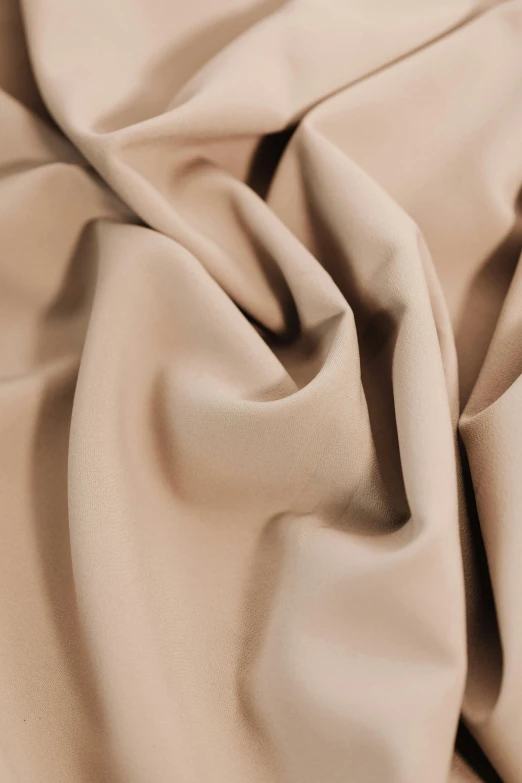 a tan fabric with slight folds