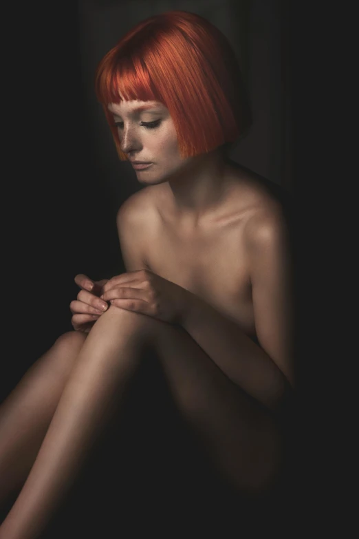 an image of a  woman with red hair