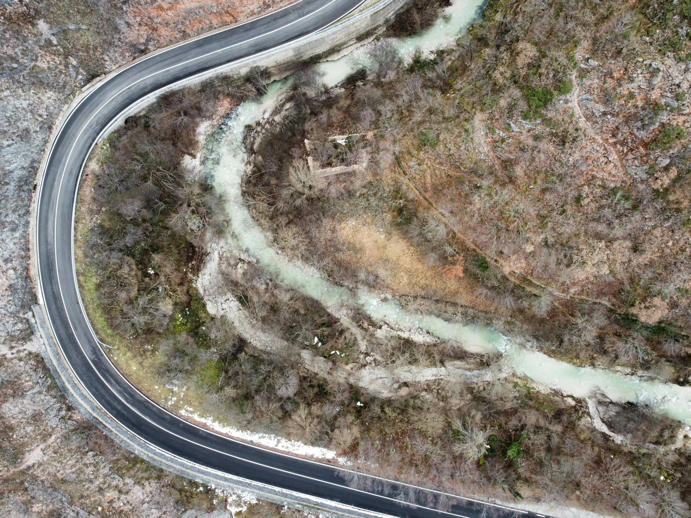 a scenic highway curves into a winding area