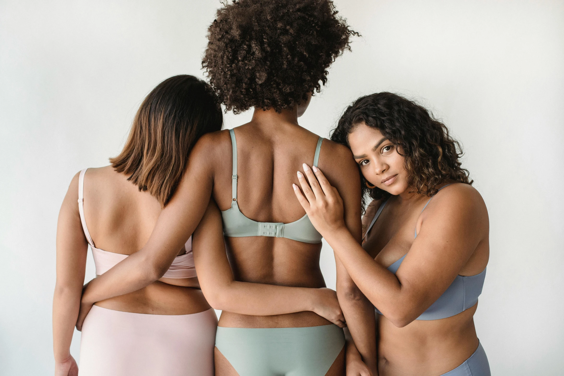 three models wearing the high rise underwiret one and the second from the same side