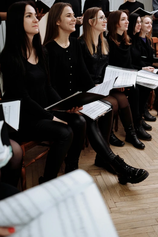 the women in the choir are all wearing black