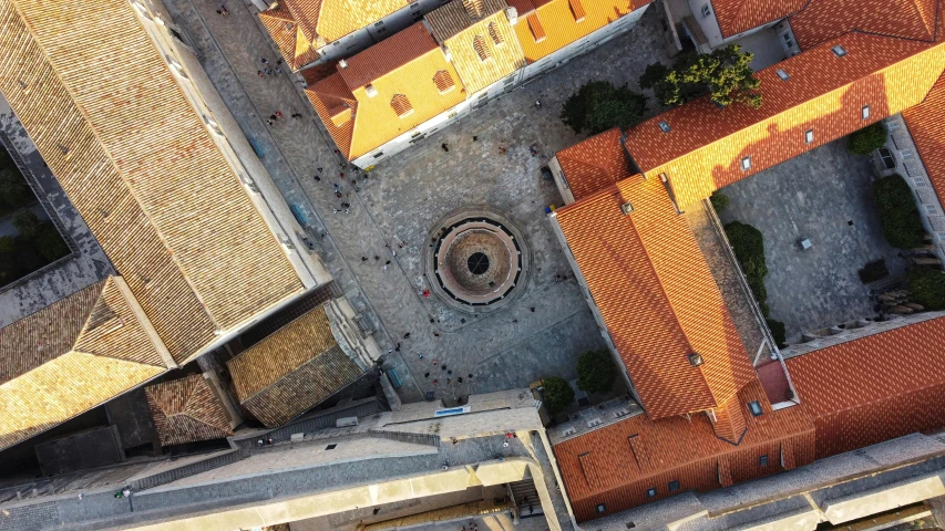 an aerial view of an open roof that has a circular hole in it