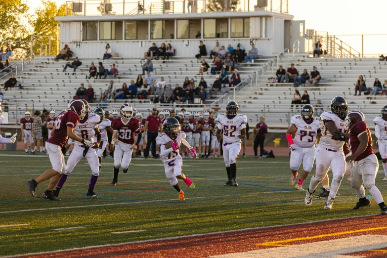 several football players in action on the field