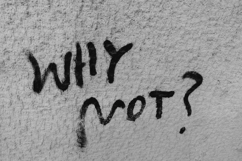 graffiti writing on the wall says, why root?