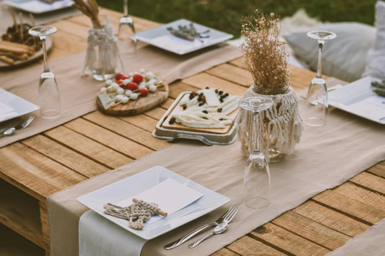 the table is set with various kinds of desserts