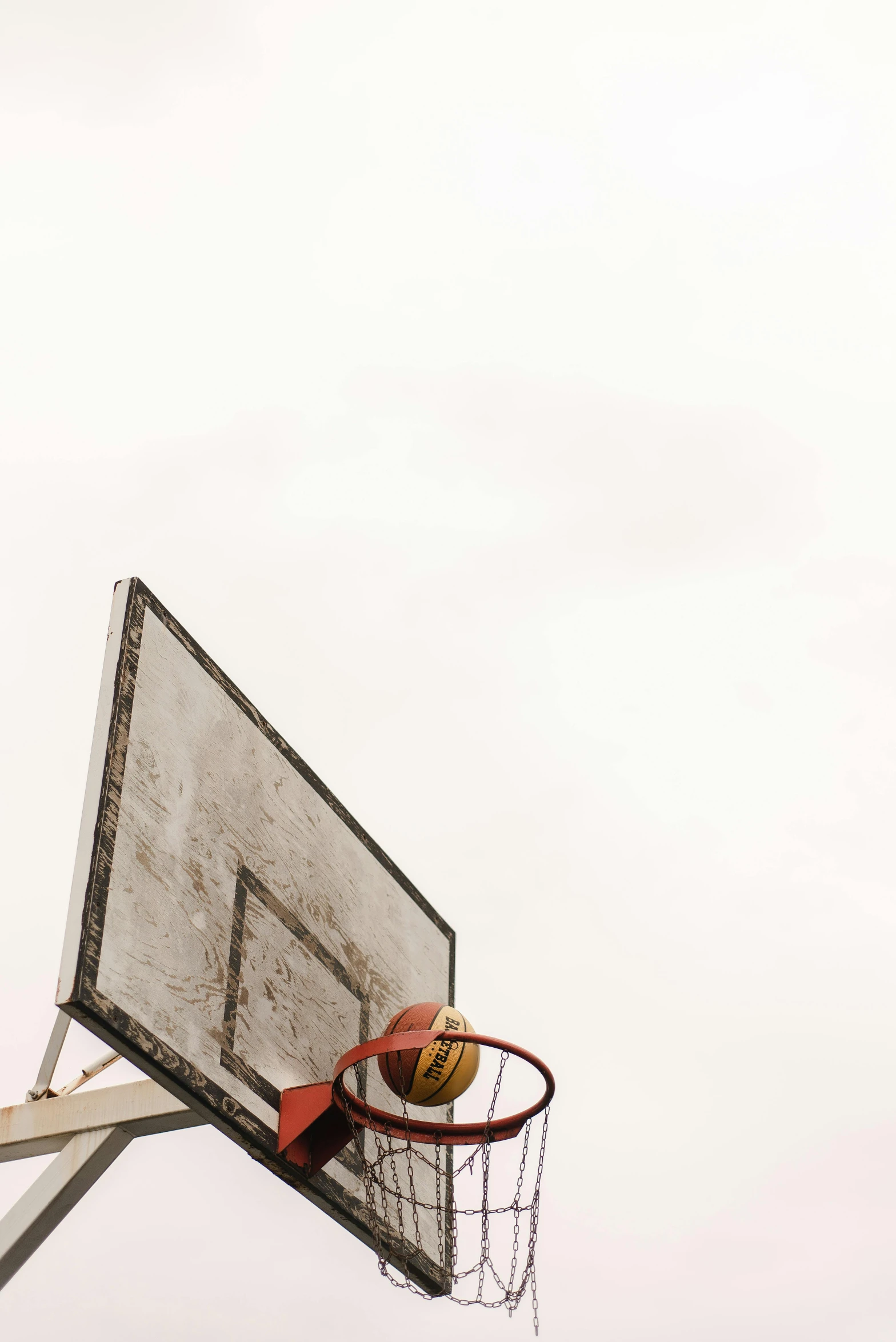 an overhead view of a basketball hoop in the air