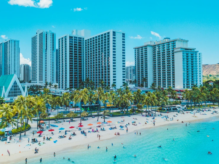 several buildings are visible near the beach and ocean