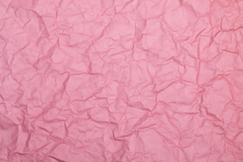 closeup of pink color, crumpled crinkled paper