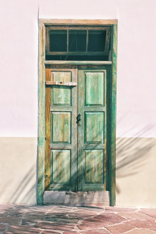 an open doorway to a building with a brick floor