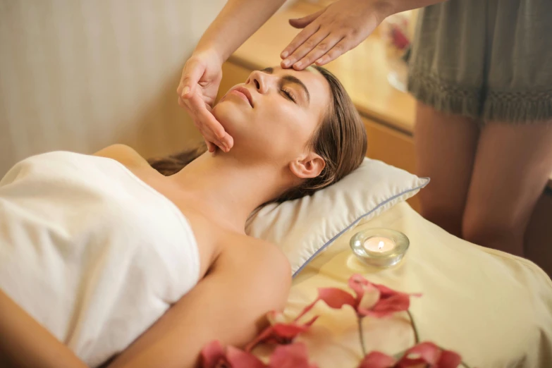 woman getting a massage from a female doctor