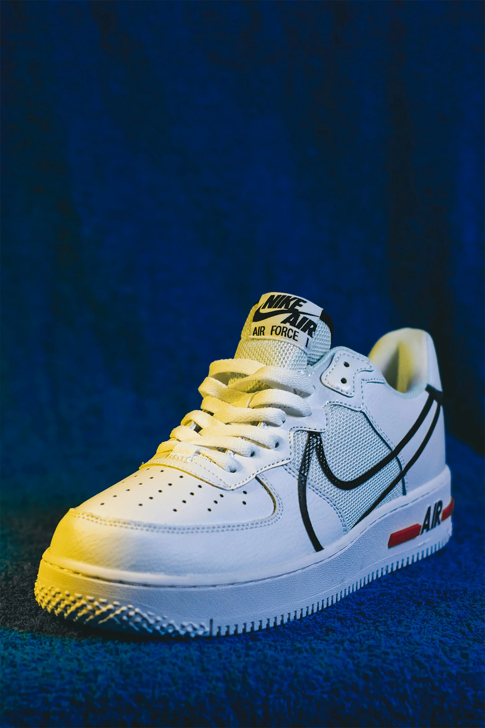 an image of a pair of white nike air force sneakers