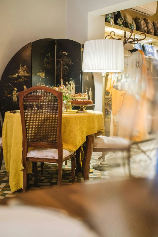 the dining room has a nice table set for two