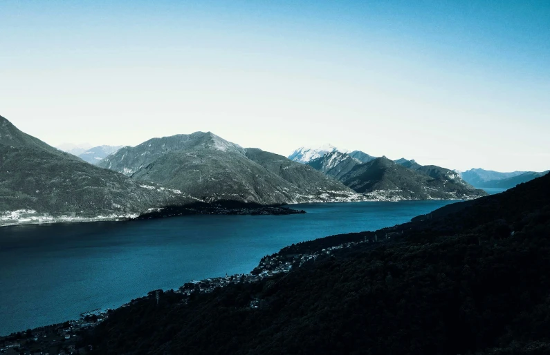 an image of a view of the ocean and mountains