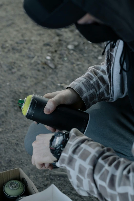 a young person holding onto a camera on a skateboard