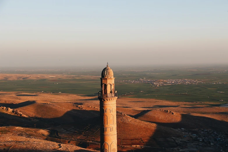 a tower with a clock on the top of it