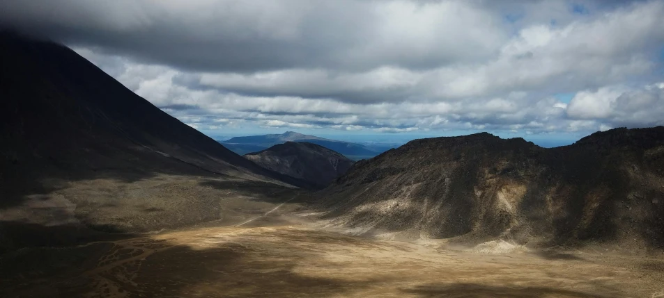 a mountain view taken from above in the middle of the desert