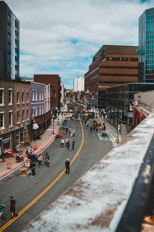 an image of people riding bikes on the street