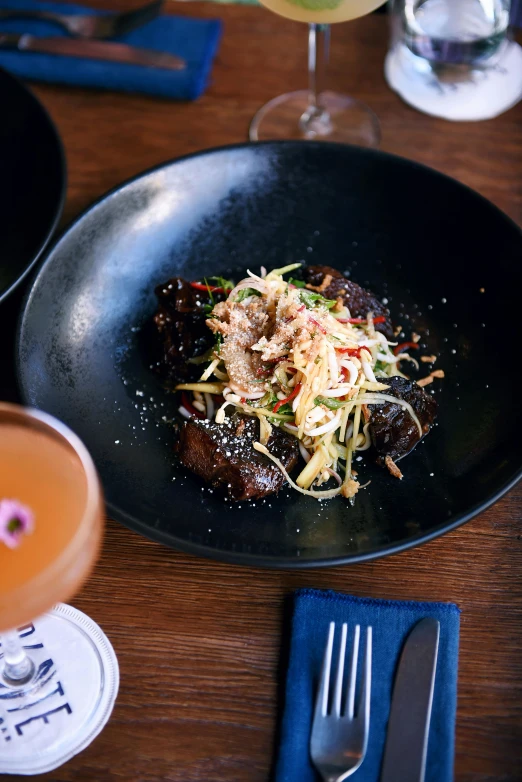 a plate with a dish in it on a table