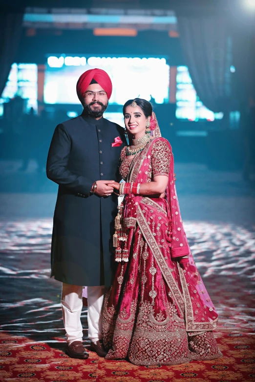 a couple dressed in indian traditional attire