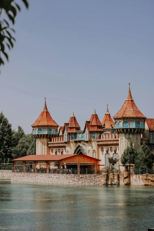 a group of buildings sitting on top of a lake