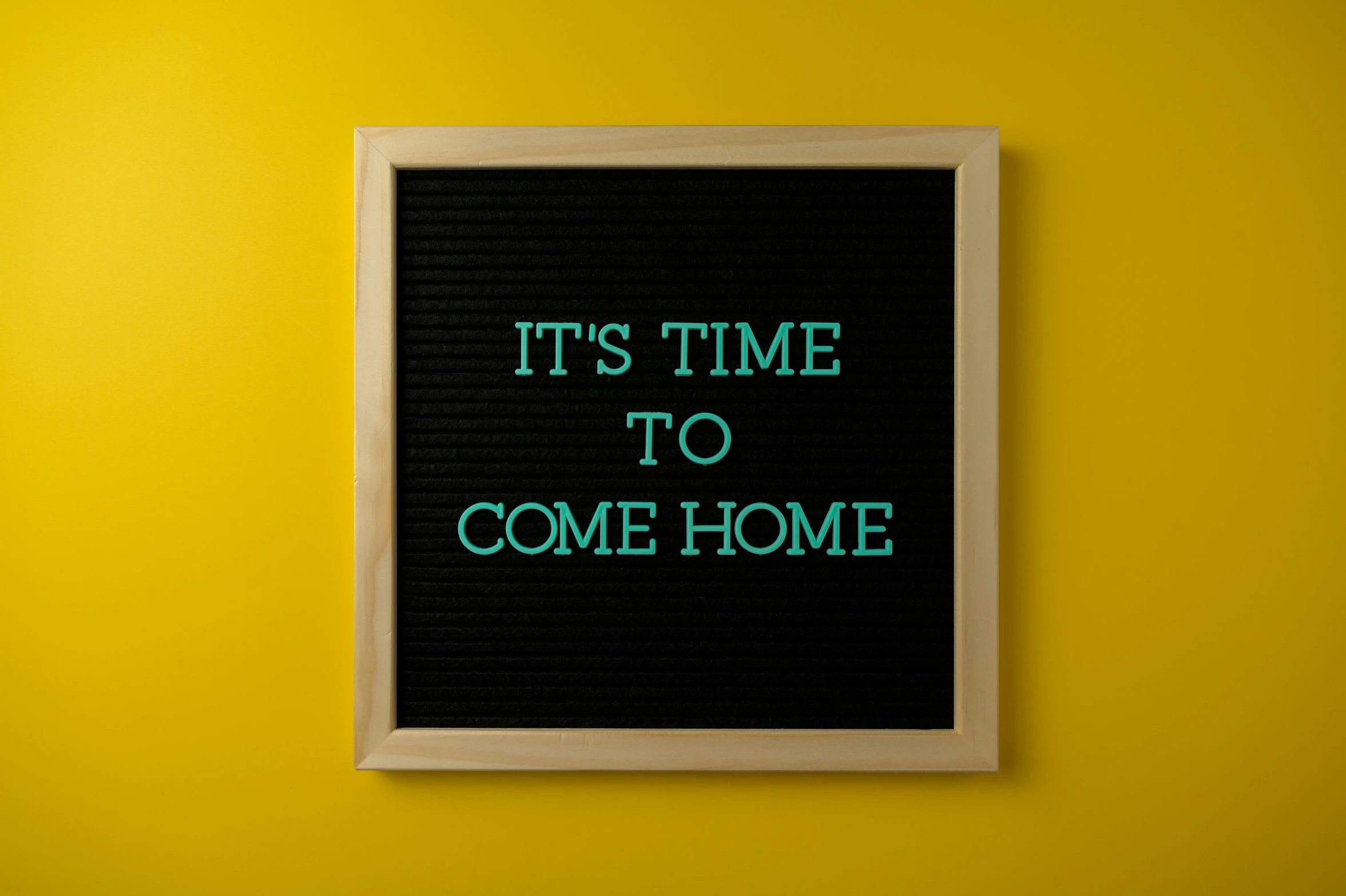 an image of a black poster that says it's time to come home