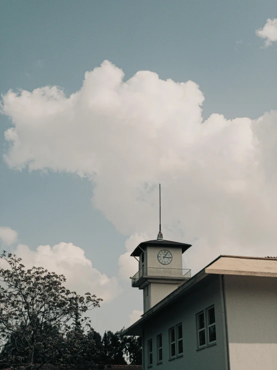 a clock tower with the sky as a background