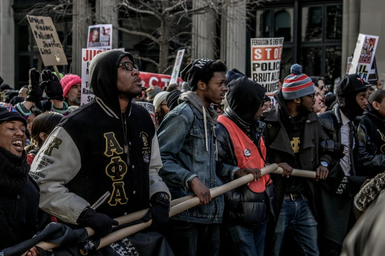 protestors in front of the capitol building, during an un general strike