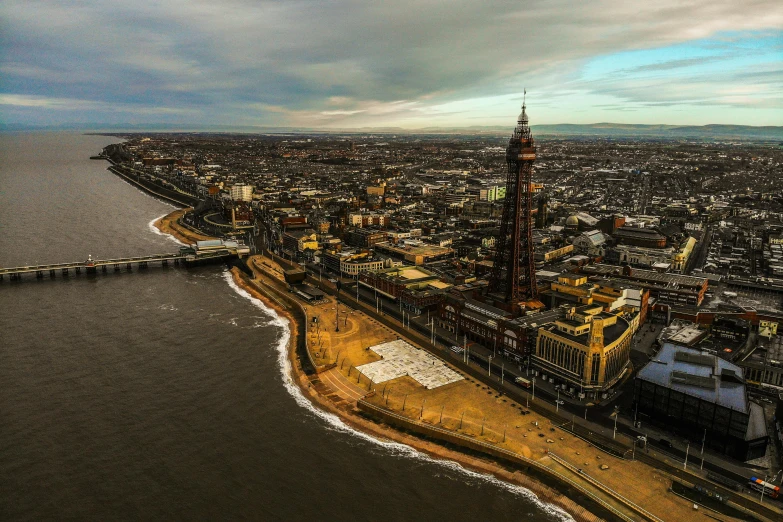 an aerial view of a city near a body of water