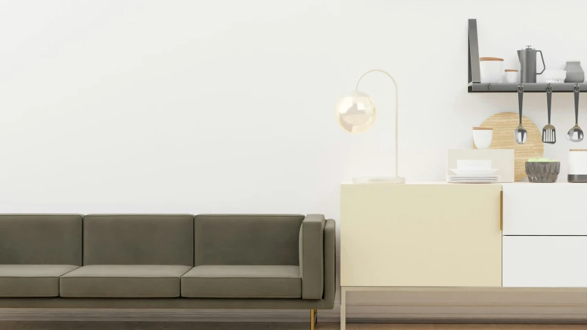 a tan couch with a side lamp is by the cabinet and shelves