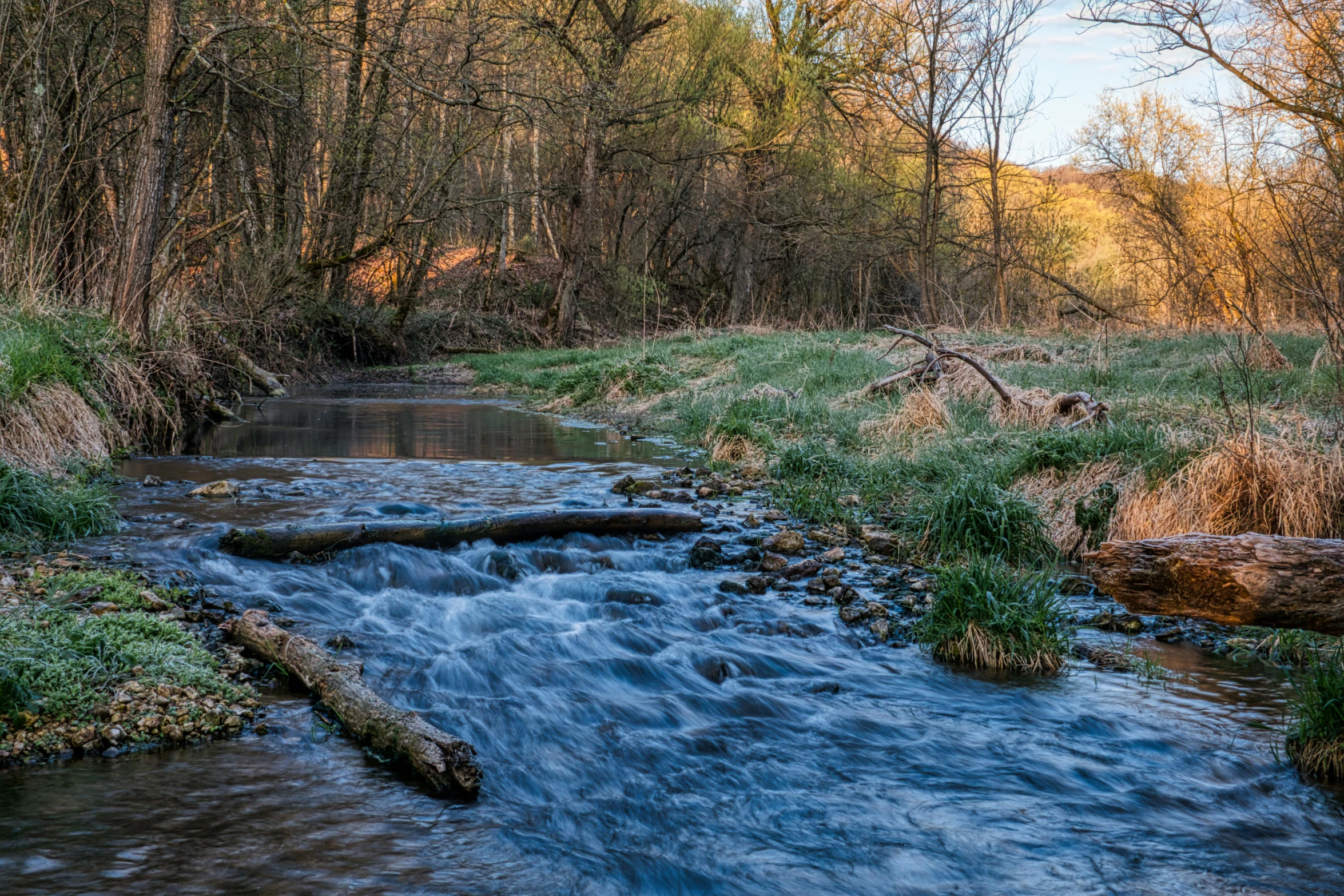 the water is running fast in the stream