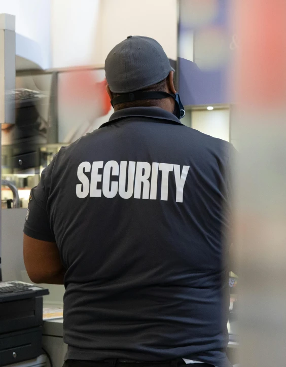security officer in a restaurant looking out of the window