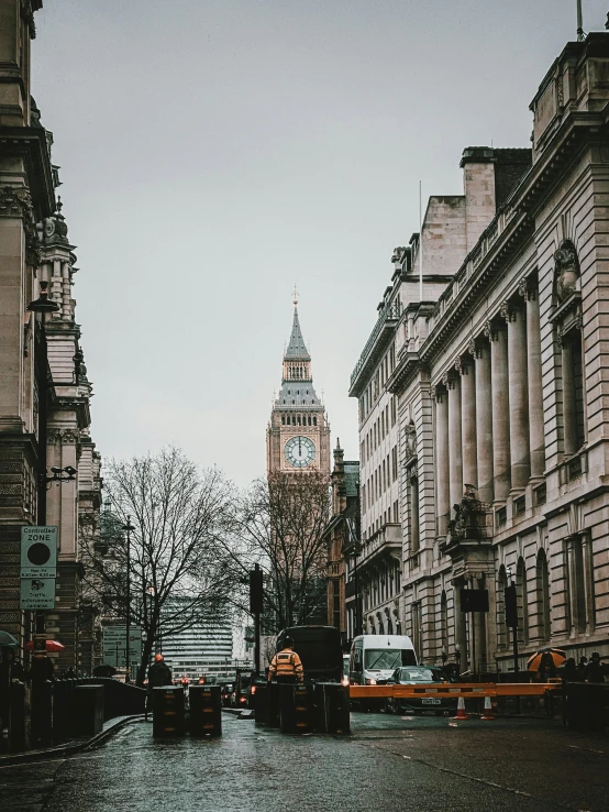 a city street with an old building behind