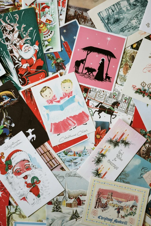 a pile of cards all decorated with a man and child