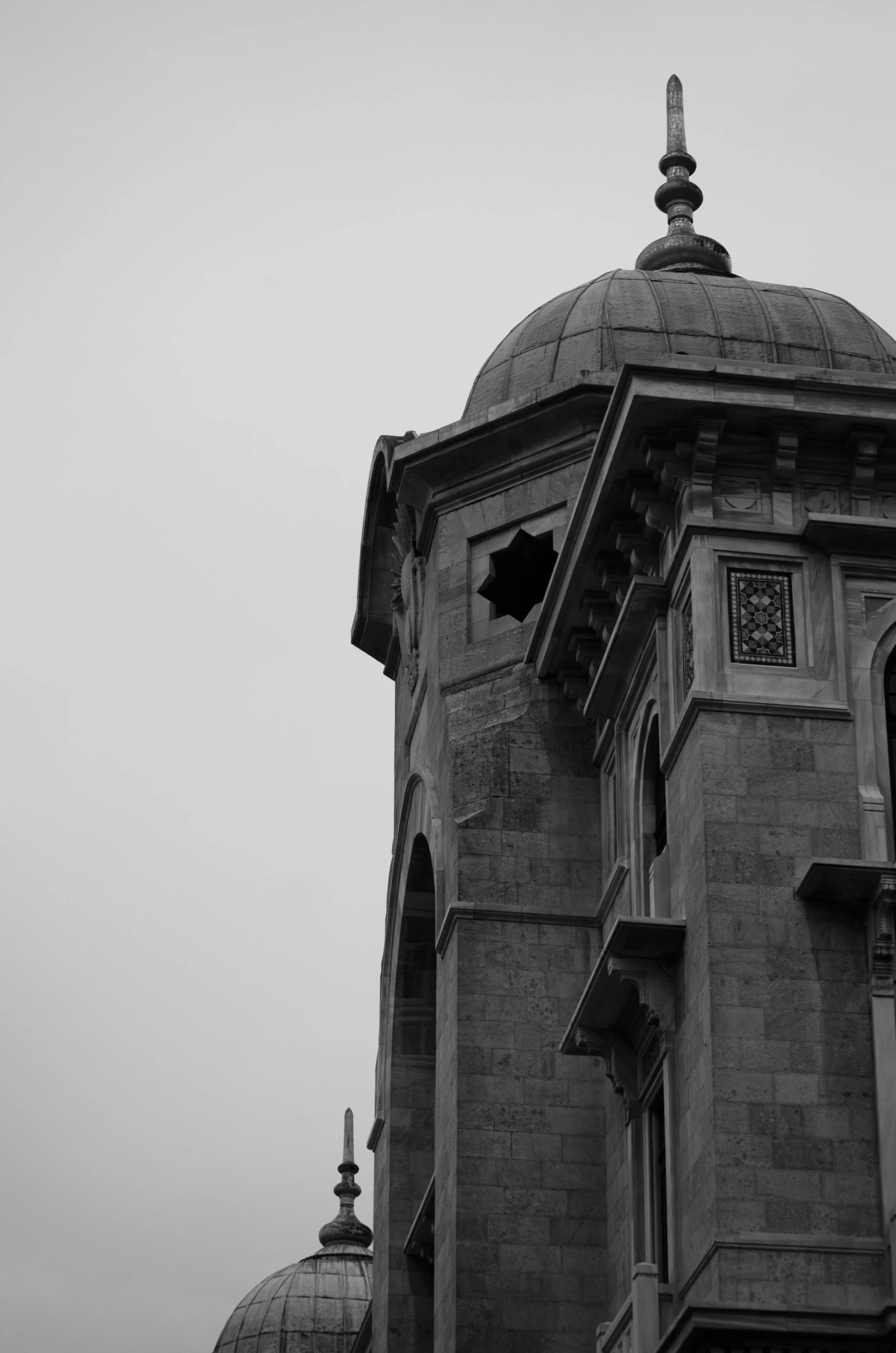 a black and white po of a clock tower