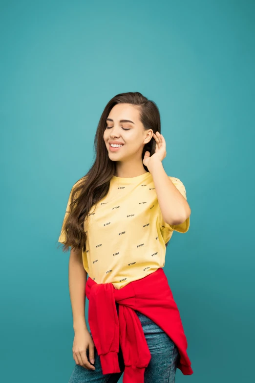 girl with a red bow holding a cellphone to her ear