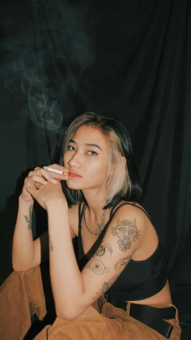 an image of a woman smoking a cigarette