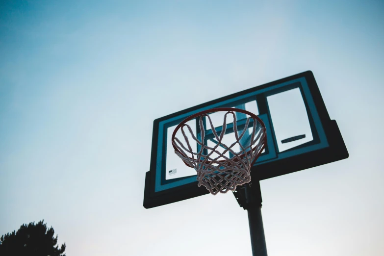 a basketball hoop is upside down over the basketball court