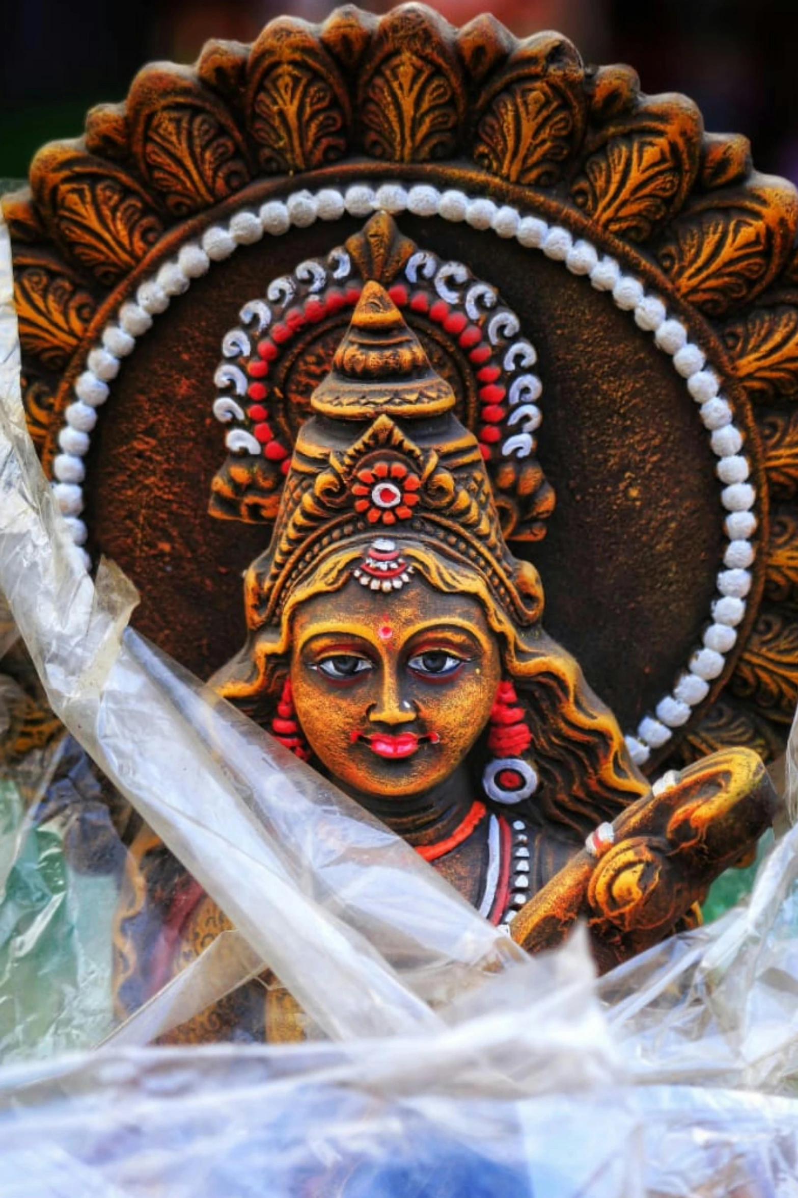 an indian style idol statue in a display