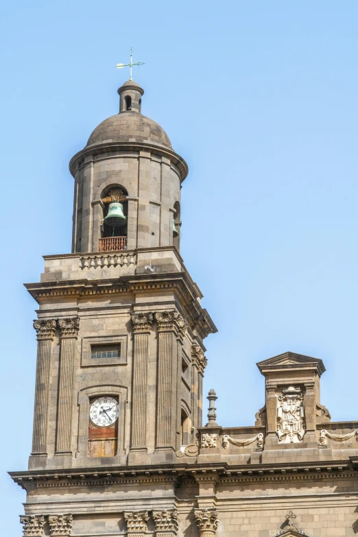 clock on the tower of the old building