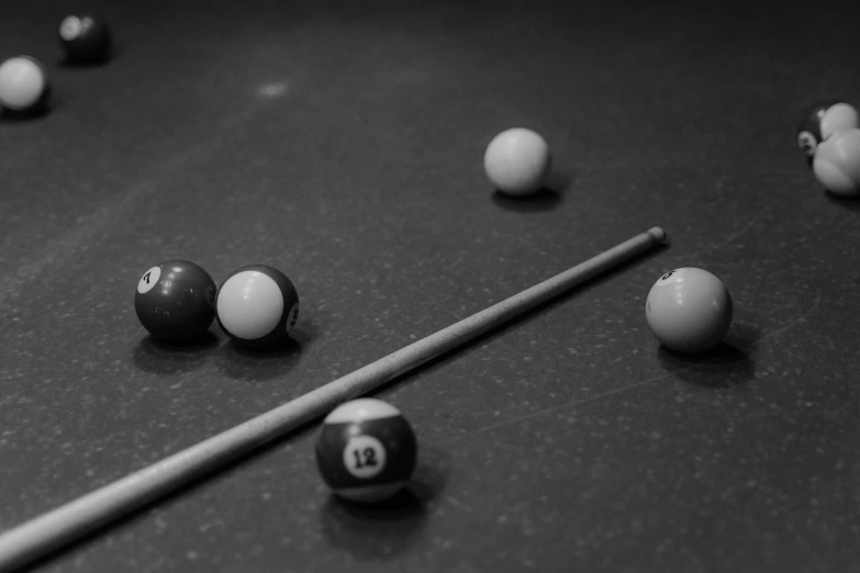 a pool table has all sorts of pool balls