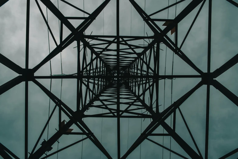 a high voltage tower up against the sky