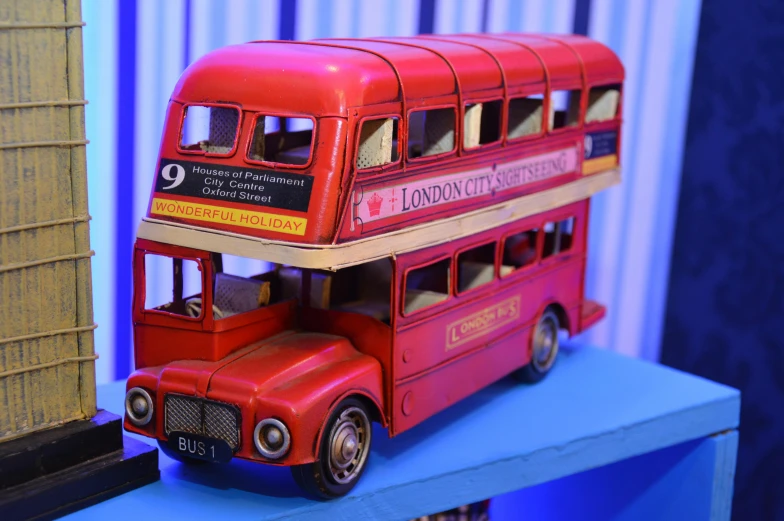 a double decker bus sitting on a table