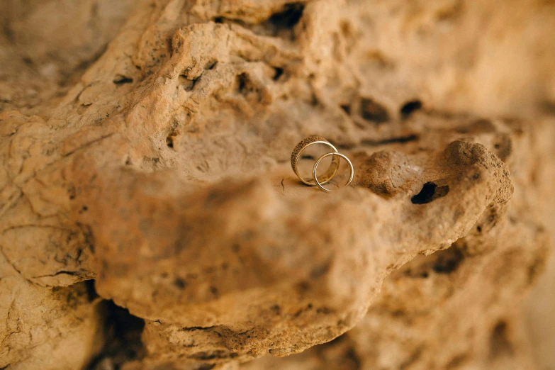 there is a stone wall that has a ring on it