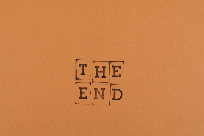 a piece of paper that reads the end on the side