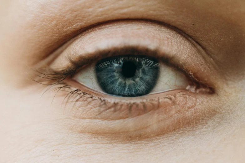 the eye of a person with blue eyes